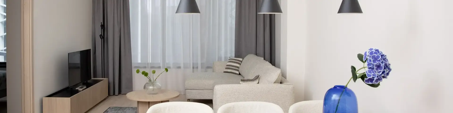 a room with a table and chairs