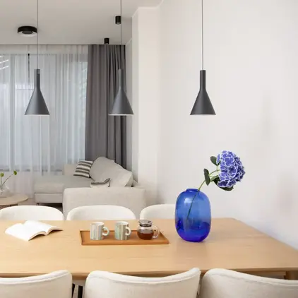 a room with a table and chairs