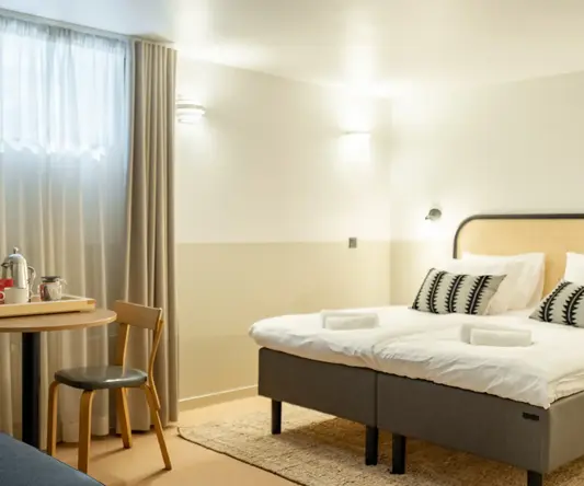 a room with a bed and a table