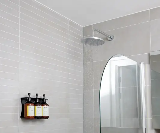 a shower head with water running from it