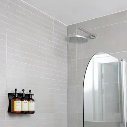 a shower head with water running from it