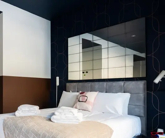 a bed with towels on it