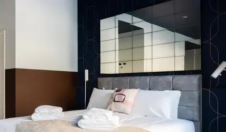 a bed with towels on it