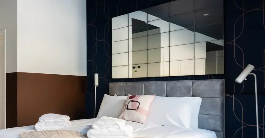 a bed with towels on it