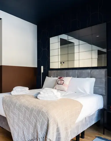 a bed with towels on it