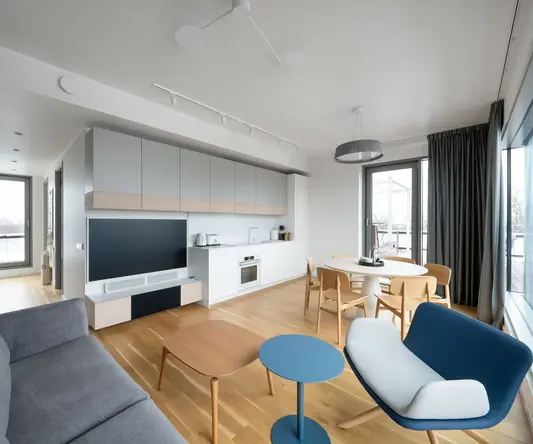 a living room with a couch and table