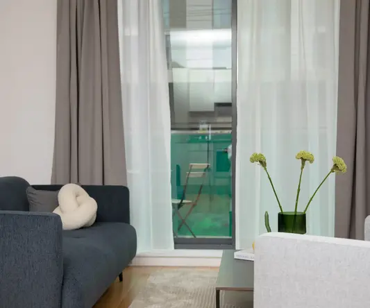 a living room with a couch and a table