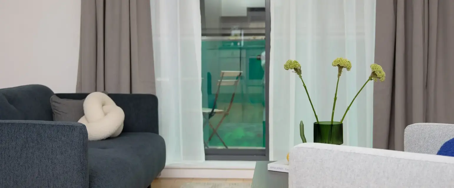 a living room with a couch and a table