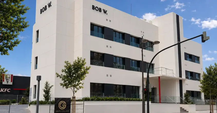 a white building with black text on it