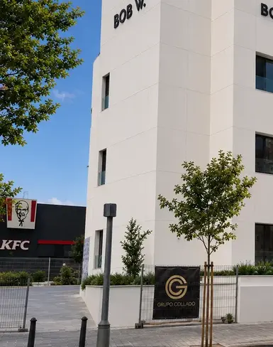 a white building with black text on it