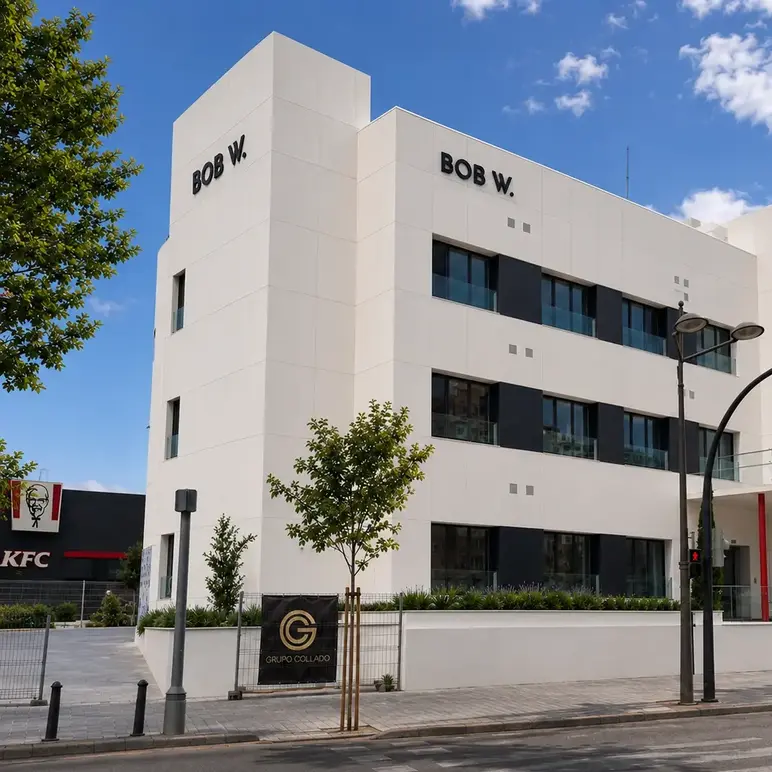 a white building with black text on it