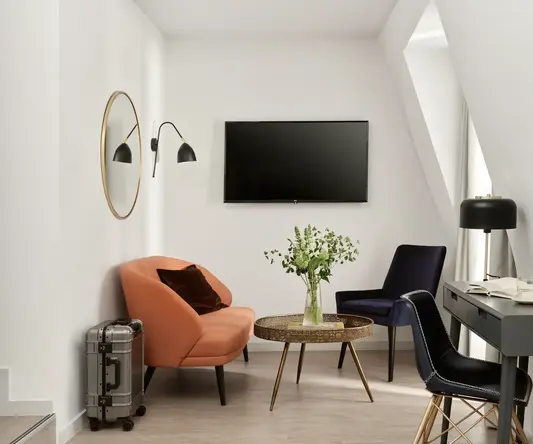 a room with a tv and a table