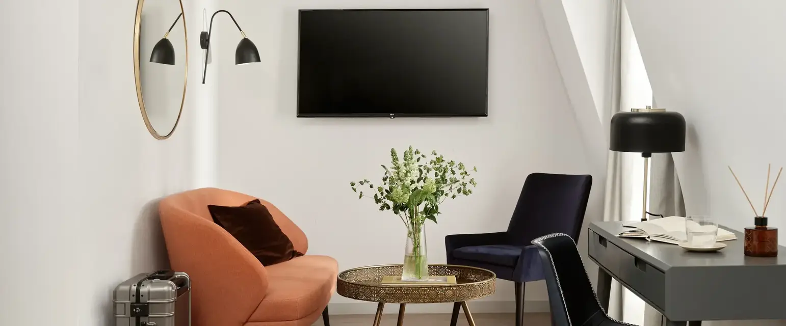 a room with a tv and a table