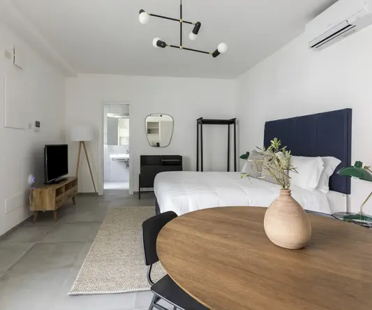 a room with a bed and a table