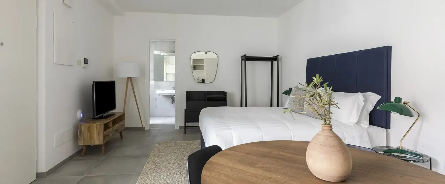 a room with a bed and a table