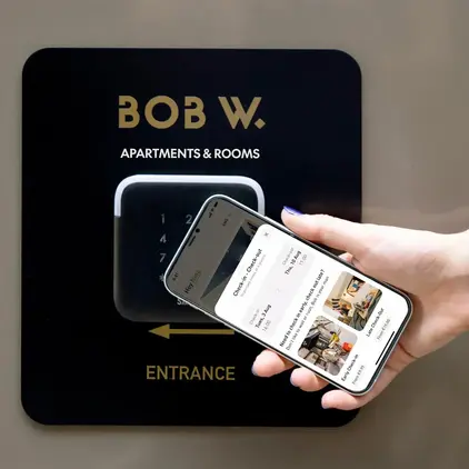 a hand holding a phone