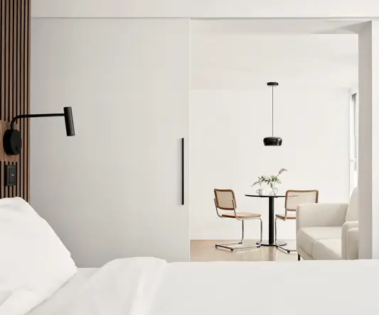 a room with a table and chairs