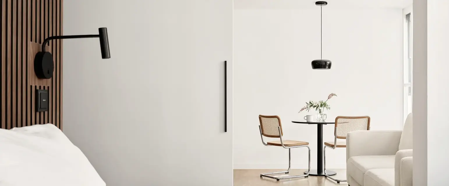 a room with a table and chairs