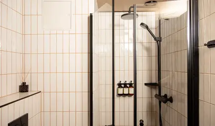 a shower with a glass door