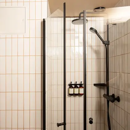 a shower with a glass door