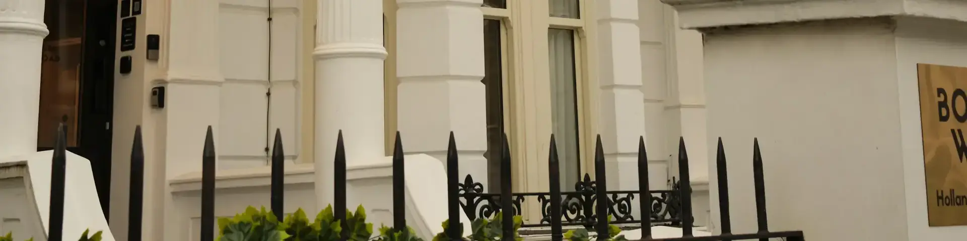a white building with a balcony
