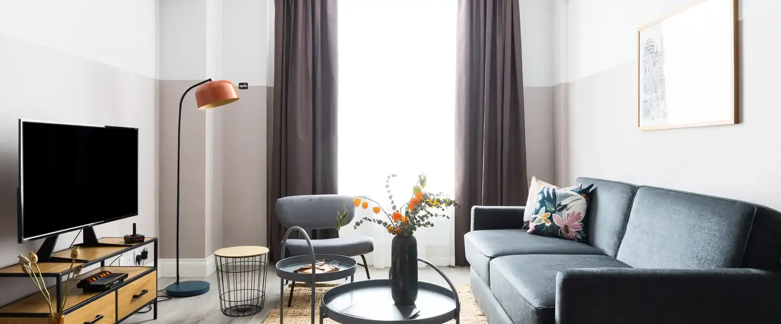 a living room with a couch and a table