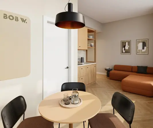 a room with a table and chairs