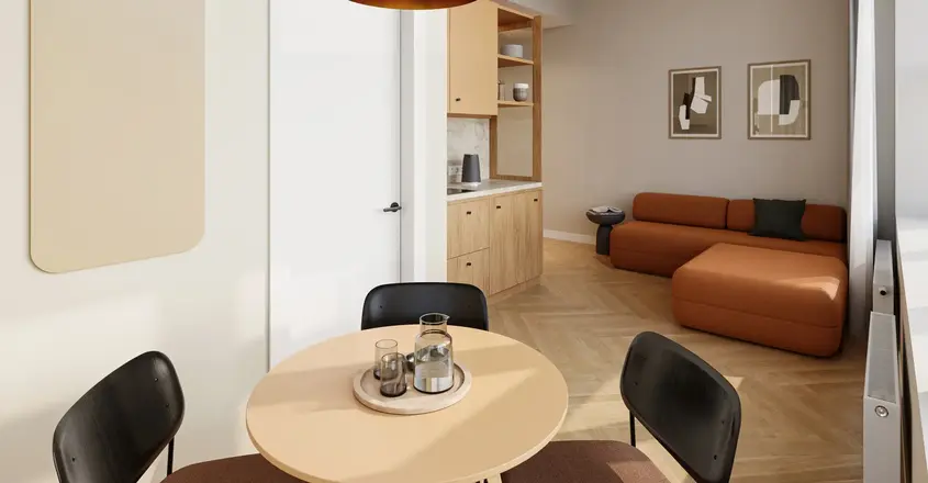 a room with a table and chairs