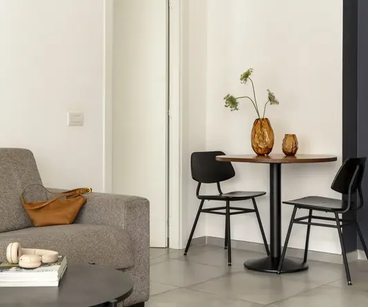 a table and chairs in a room