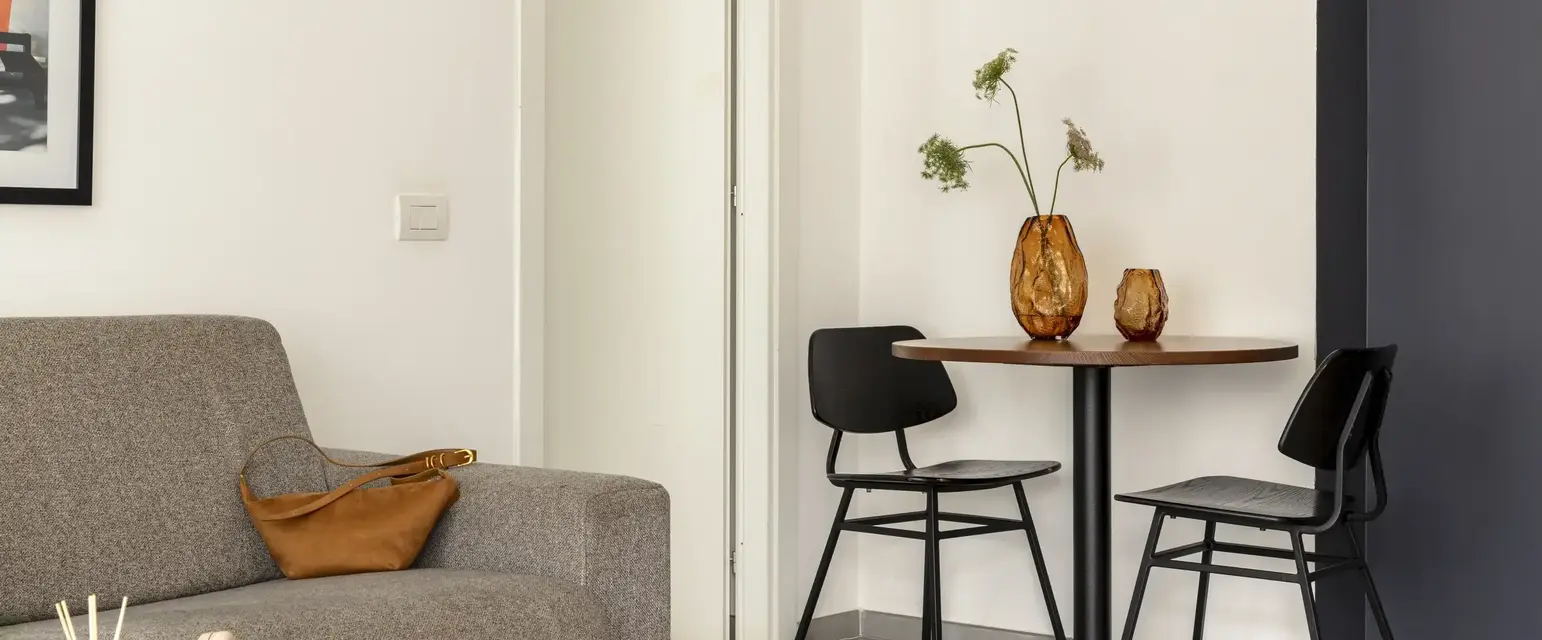 a table and chairs in a room