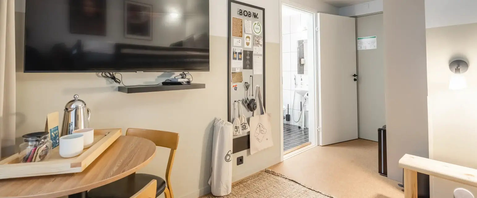 a room with a tv and table