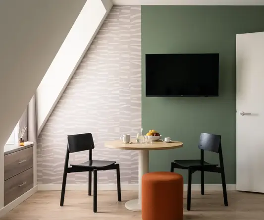 a table and chairs in a room