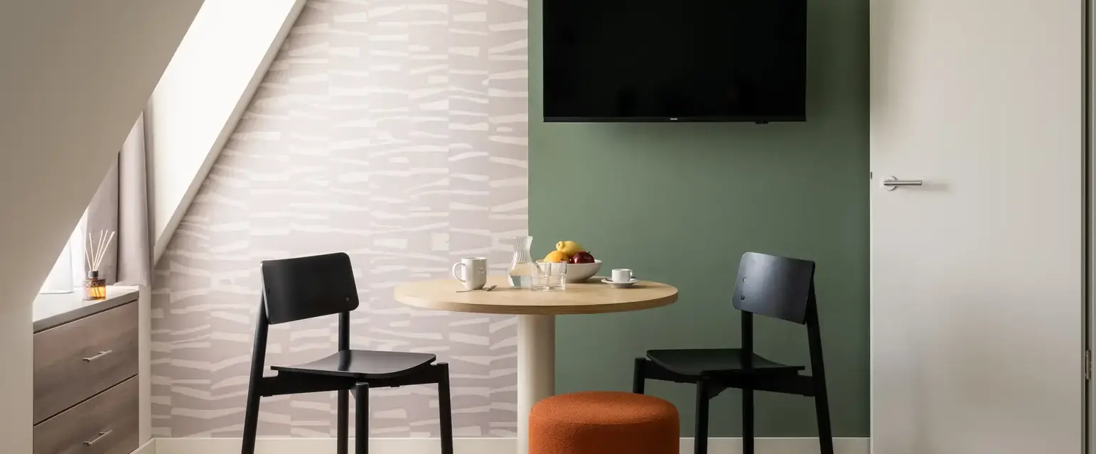 a table and chairs in a room