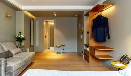 a room with a couch and a bed