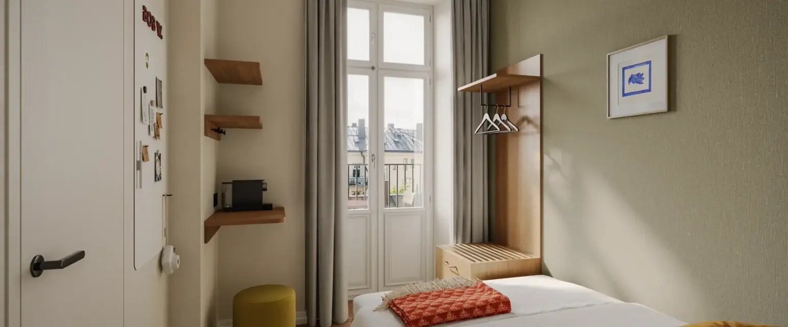 a bedroom with a bed and a window