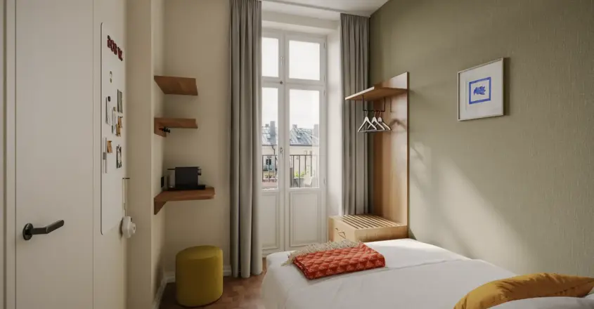 a bedroom with a bed and a window