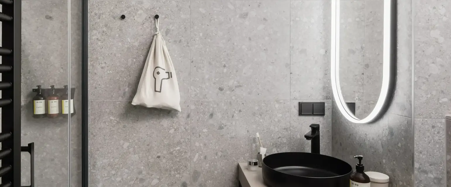 a bathroom with a sink and shower