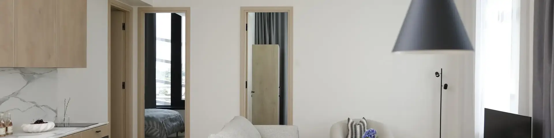 a living room with a couch and a table