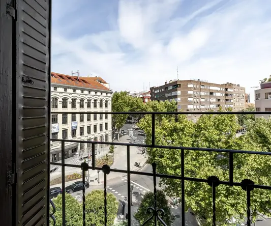 a view of a city from a balcony