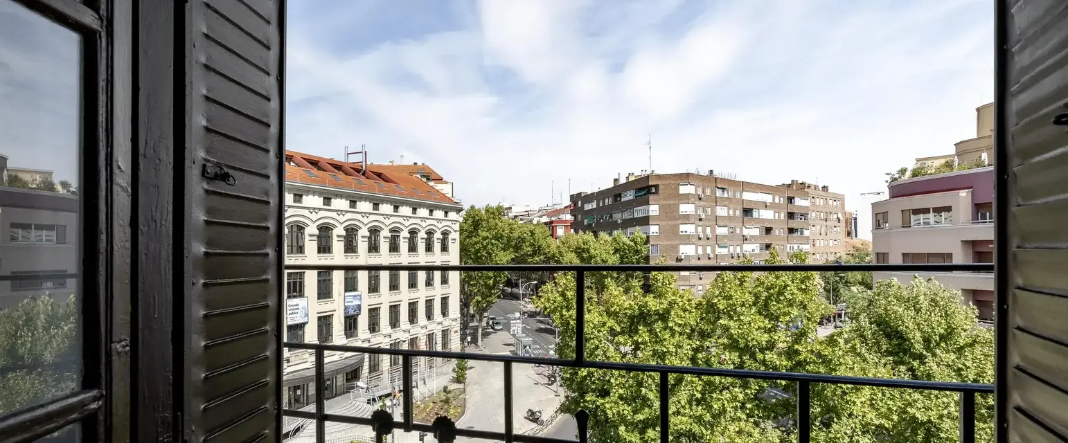a view of a city from a balcony