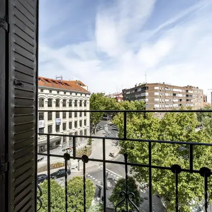 a view of a city from a balcony