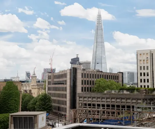 a city with a tall triangular building