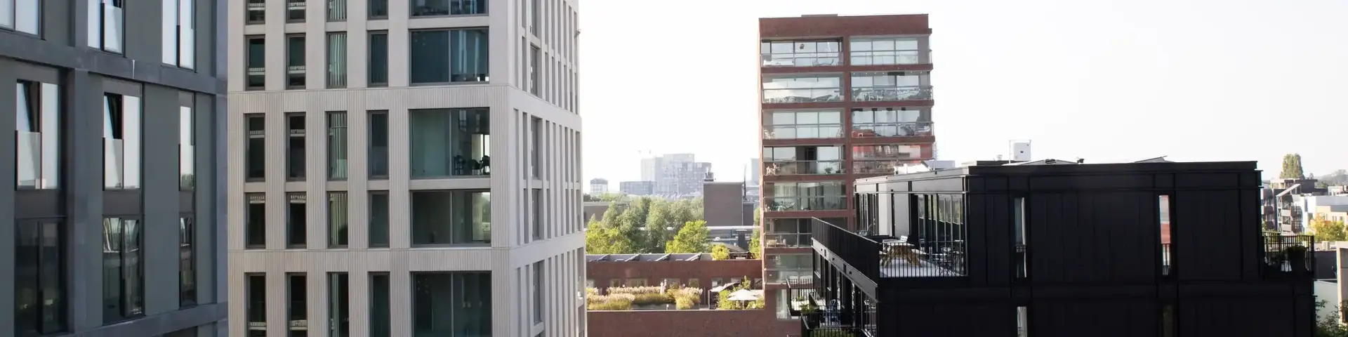 a group of buildings with solar panels