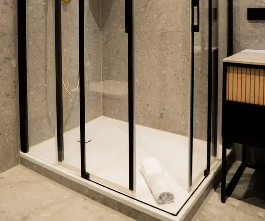 a shower with glass doors
