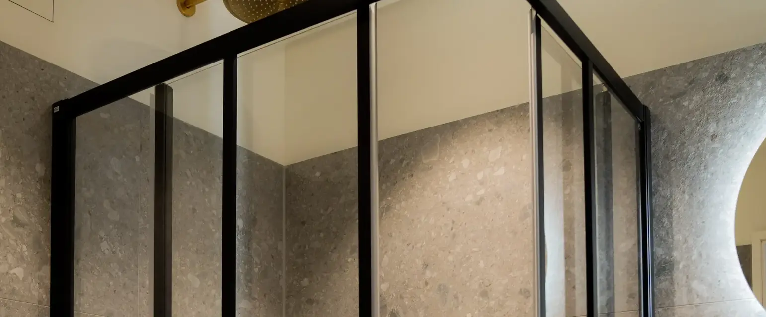 a shower with glass doors