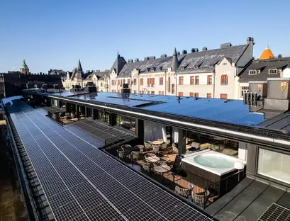 a rooftop with solar panels on the roof