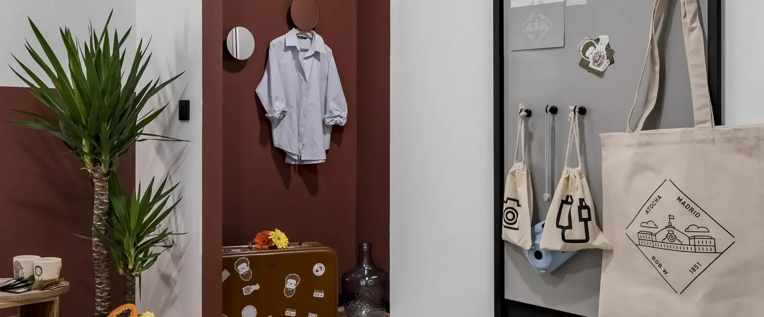 a room with a grey board and a brown and white wall