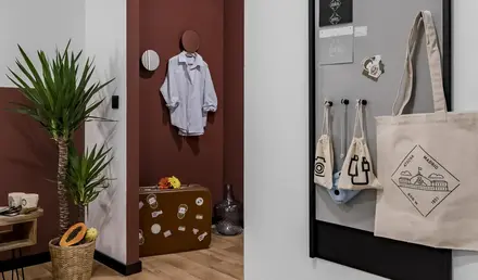 a room with a grey board and a brown and white wall