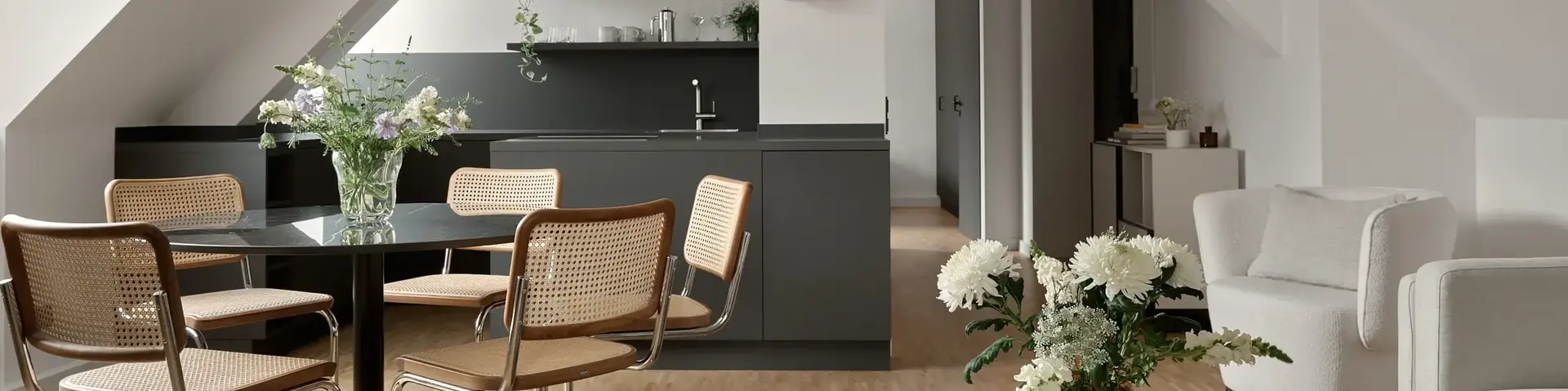 a room with a table and chairs