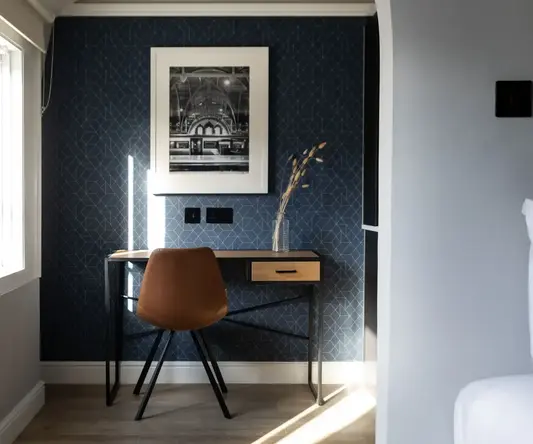 a desk and chair in a room